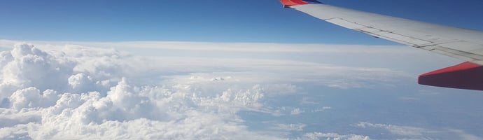 image showing a commercial plane in flight