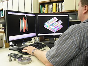 Man working on roll forming die design image